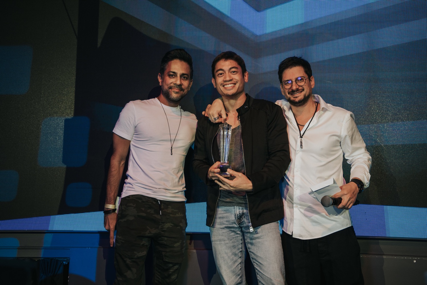 Ezekiel Vicente with the Mindvalley workplace recognition team